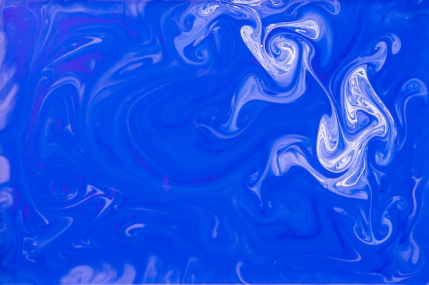 Free photo abstract hand drawn fluid background