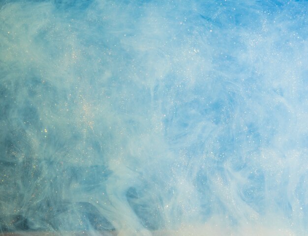 abstract heavy blue fog with white bits