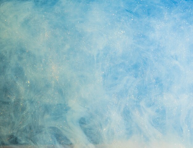 Abstract heavy blue fog with white bits