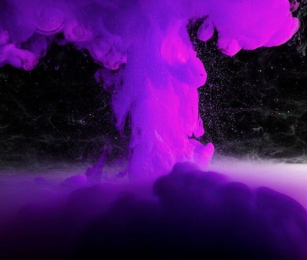 Abstract heavy purple fog in darkness