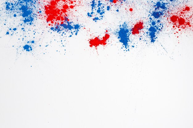 Abstract holi color powder explosion on a white background