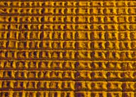 Free photo abstract honeycomb with yellow sand