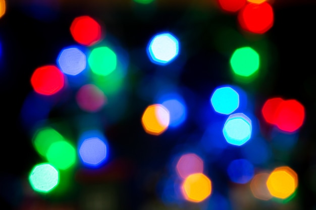 Abstract illumination , colorful bokeh on black background