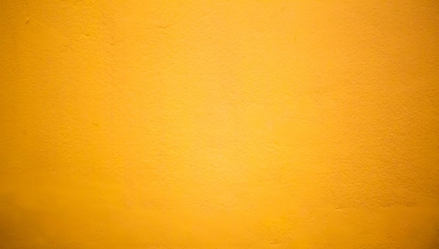 Abstract Luxury Clear Yellow wall well use as backdrop,background and layout.