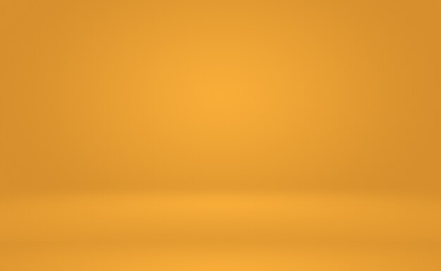 Abstract Luxury Gold yellow gradient studio wall, well use as background,layout,banner and product presentation.