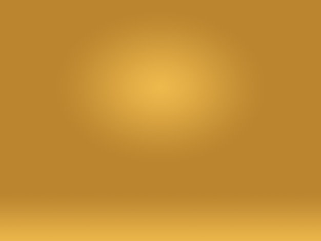 Abstract Luxury Gold yellow gradient studio wall, well use as background,layout,banner and product presentation.