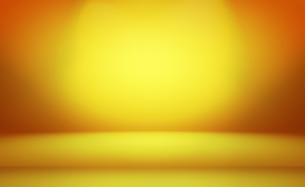 Abstract Luxury Gold yellow gradient studio wall, well use as background,layout,banner and product presentation.