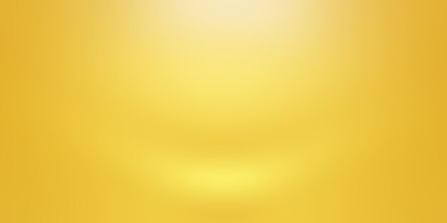 Abstract Luxury Gold yellow gradient studio wall, well use as background,layout,banner and product presentation.