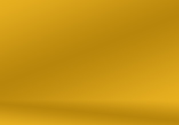 Abstract Luxury Gold yellow gradient studio wall, well use as background,layout,banner and product presentation.