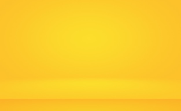 Free photo abstract luxury gold yellow gradient studio wall, well use as background,layout,banner and product presentation.