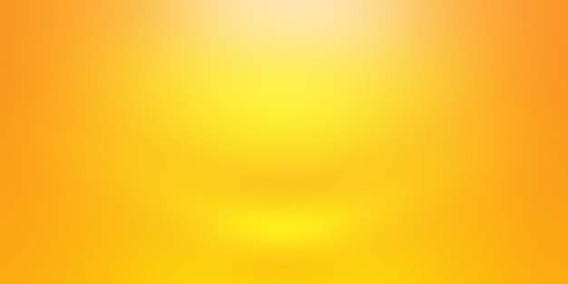 Free photo abstract luxury gold yellow gradient studio wall, well use as background,layout,banner and product presentation.