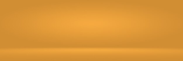 Abstract Luxury Gold yellow gradient studio wall, well use as background,layout,banner and product presentation.