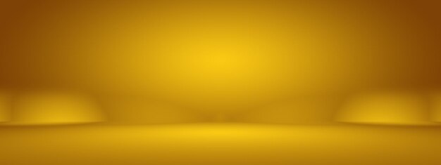 무료 사진 추상 럭셔리 골드 노란색 그라데이션 스튜디오 벽은 배경 레이아웃 배너 및 제품 프레젠테이션으로 잘 사용됩니다.