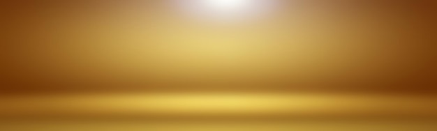 Абстрактная роскошная золотисто-желтая градиентная стена студии хорошо используется в качестве фонового баннера и презентации продукта