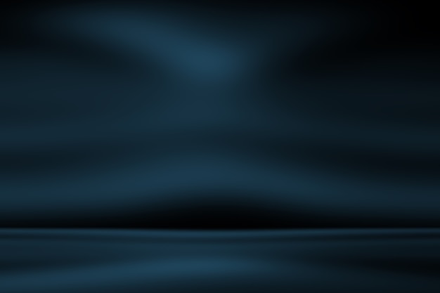 抽象的な贅沢なグラデーション青い背景。ブラックビネットスタジオバナー付きの滑らかなダークブルー。