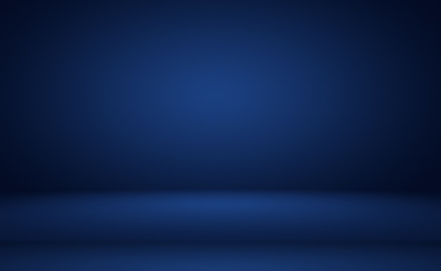 抽象的な豪華なグラデーションの青い背景。黒のビネットで滑らかなダークブルー。