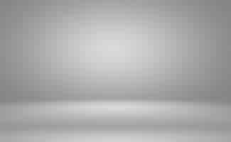 Free photo abstract luxury plain blur grey and black gradient, used as background studio wall for display your products.