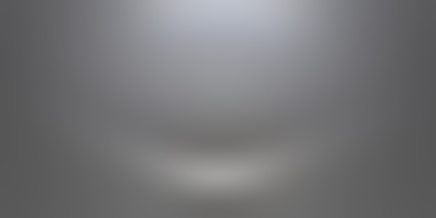 Free photo abstract luxury plain blur grey and black gradient, used as background studio wall for display your products.