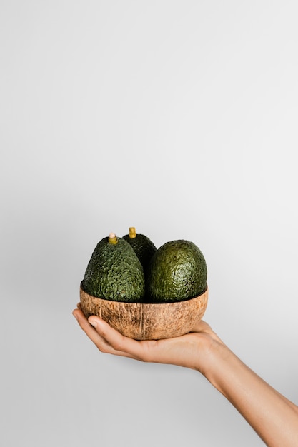 Abstract minimal concept avocados in bowl