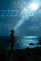 Foto gratuita concetto astratto di numerologia con l'uomo in riva al mare