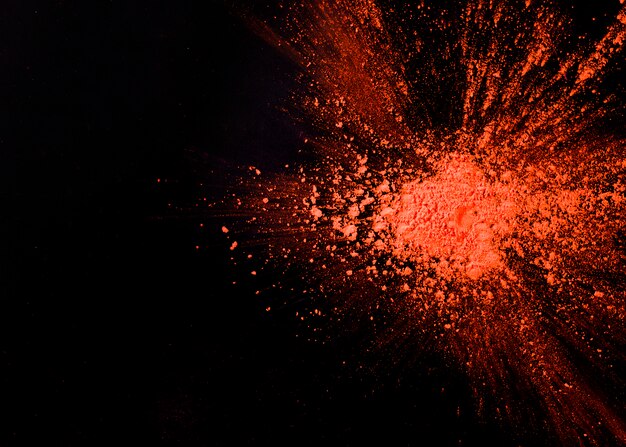 Abstract orange powder splatted background