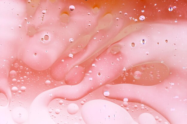 Abstract pattern background with oil bubbles floating on water