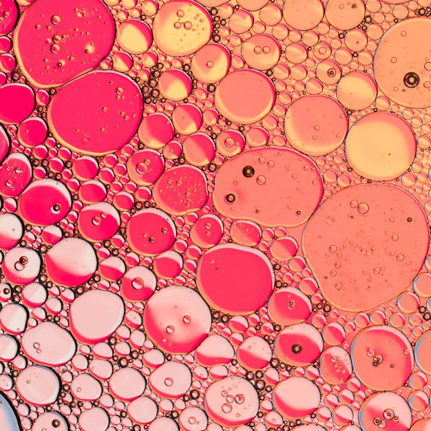 Abstract pink honeycomb with bubbles