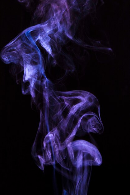 Free photo abstract purple vaporizers fragrant steam over black backdrop