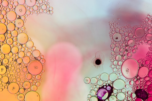 Free photo abstract of rainbow oil drops on water