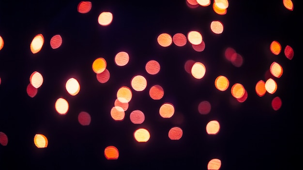 Free photo abstract red specks of light