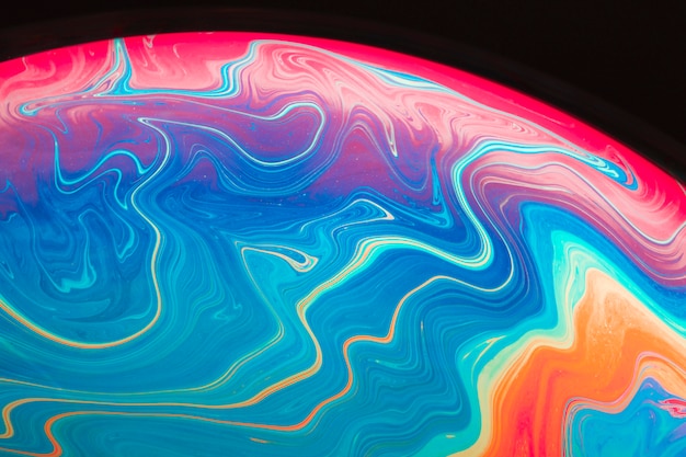 Abstract saturated soap bubble on black background