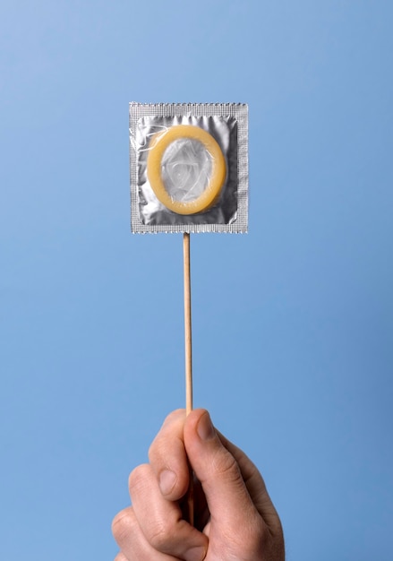 Free photo abstract sexual health composition with condom