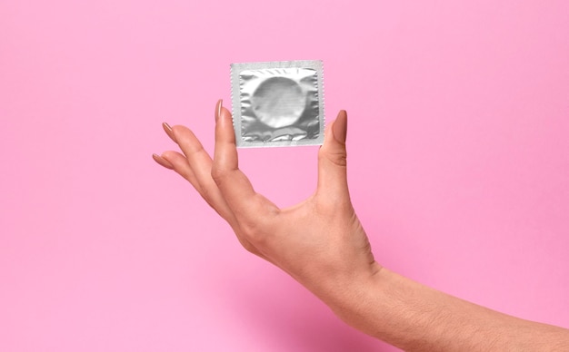 Abstract sexual health composition with condom