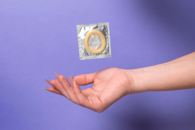 Abstract sexual health composition with condom