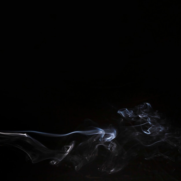 Abstract smoke isolated on black backdrop