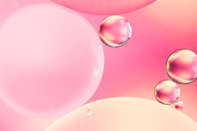 Бесплатное фото Абстрактные гладкие пузыри на размытом фоне