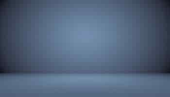Free photo abstract smooth dark blue with black vignette studio well use as background,business report,digital,website template,backdrop.