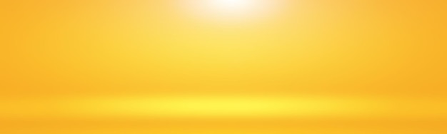 Free photo abstract solid of shining yellow gradient studio wall room background