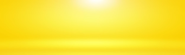 Abstract solid of shining yellow gradient studio wall room background