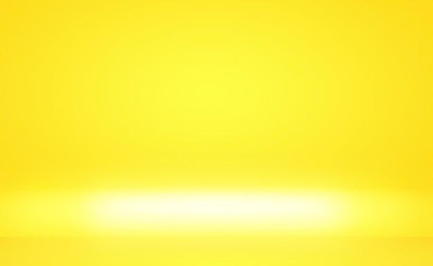 Abstract solid of shining yellow gradient studio wall room background