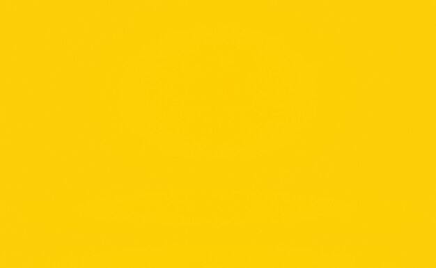 Abstract solid of shining yellow gradient studio wall room background.