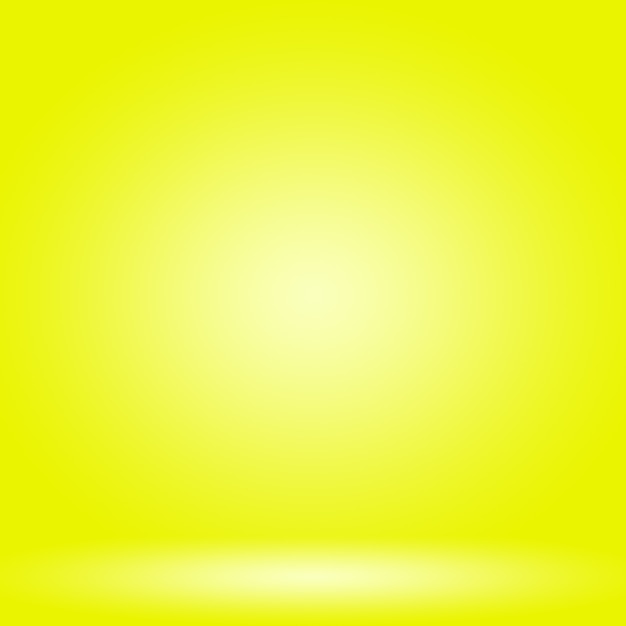 Abstract solid of shining yellow gradient studio wall room background