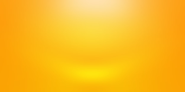 Abstract solid of shining yellow gradient studio wall room background.