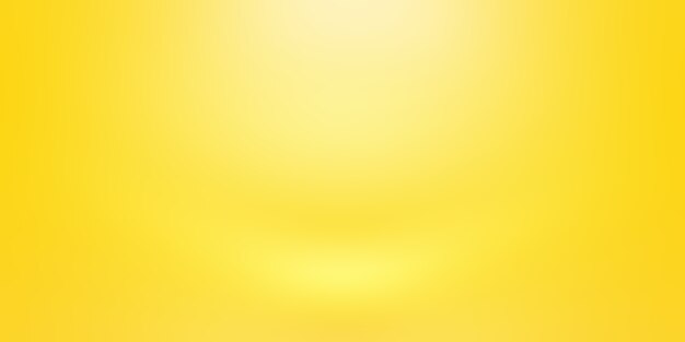 Abstract solid of shining yellow gradient studio wall room background.