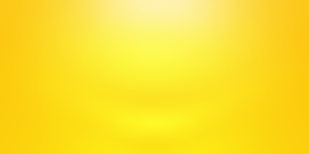 Abstract solid of shining yellow gradient studio wall room background.