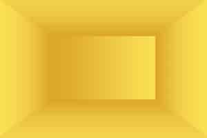 Free photo abstract solid of shining yellow gradient studio wall room background.
