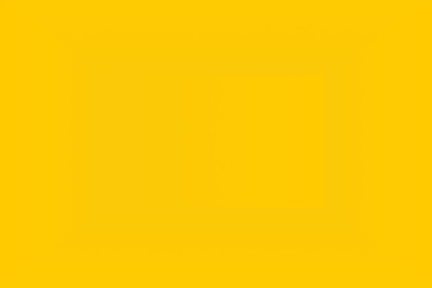 Free photo abstract solid of shining yellow gradient studio wall room background.