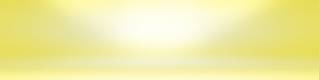 Free photo abstract solid of shining yellow gradient studio wall room background.