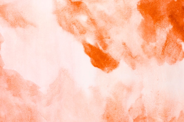 Abstract stains of orange aquarelle background