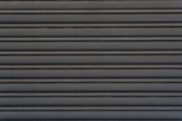 Foto gratuita strisce orizzontali astratte della parete d'acciaio